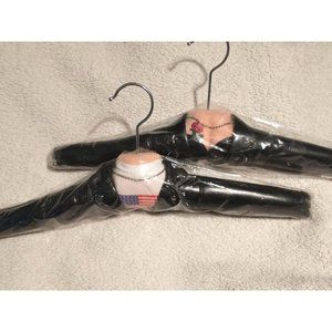 (2) New in plastic 'Biker' hangers. Heavy duty, decorated clothes hangers